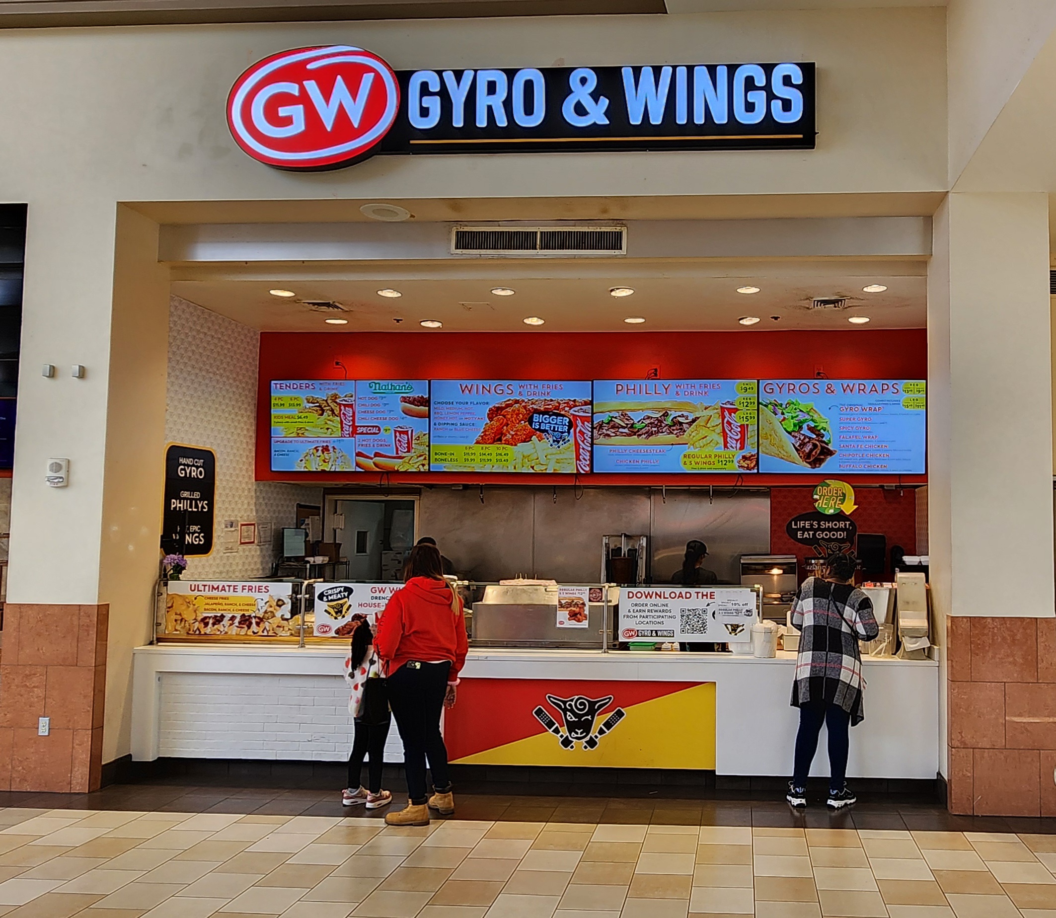 Customers ordering food at a GW Gyro and Wings restaurant in Kennesaw Georgia Town Center Mall.