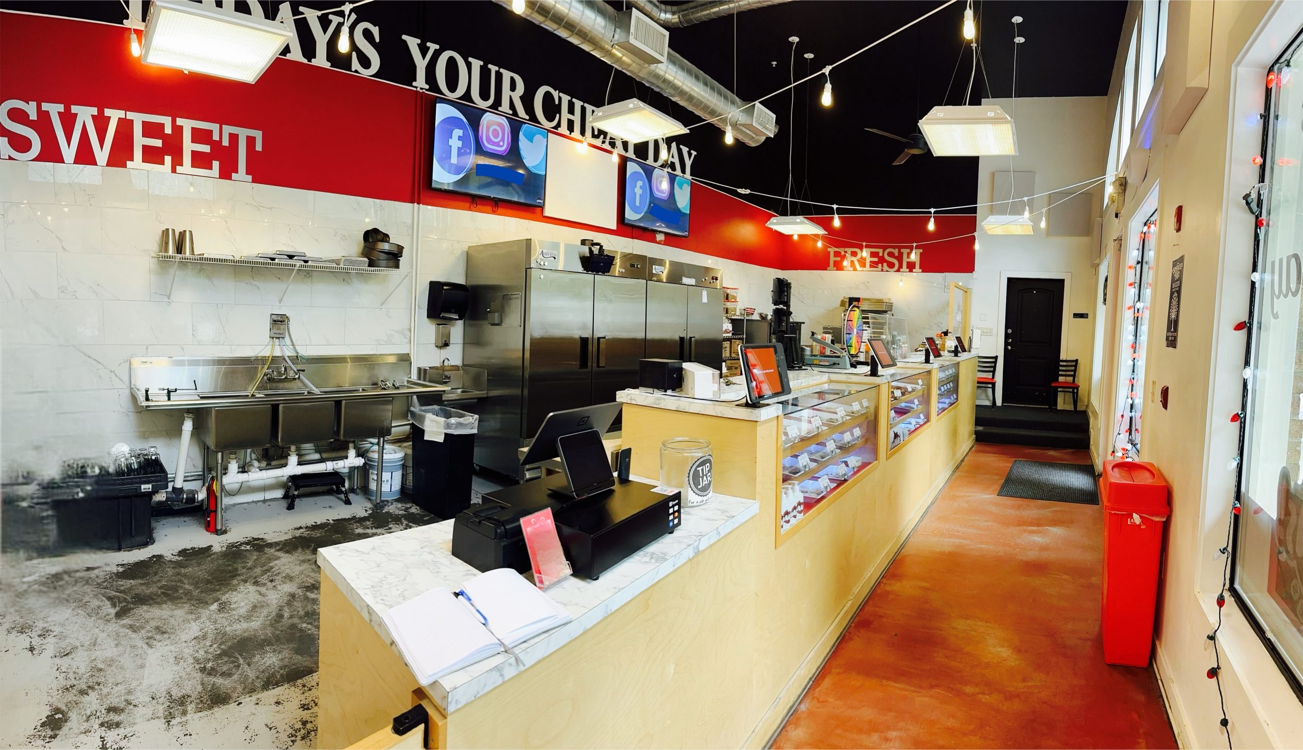 Cookie shop kitchen with refrigerators and kitchen equipment