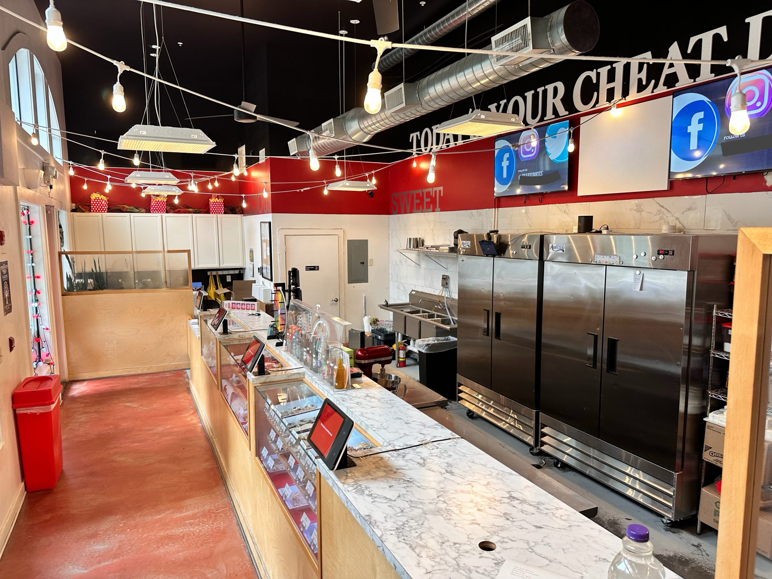 Cookie shop full view of counter and kitchen equipment ready for operations