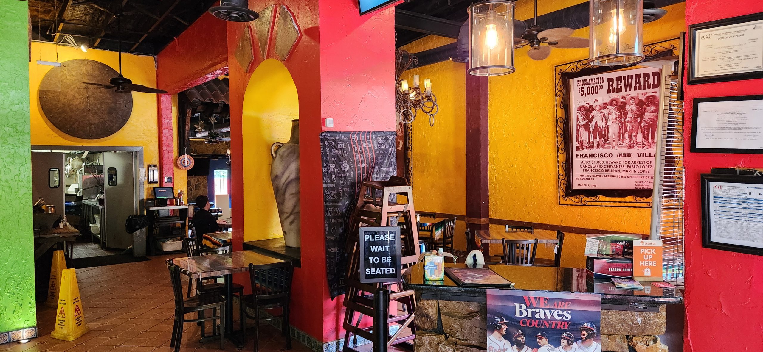 Foyer receiving area of a Mexican Restaurant with host stand listed by Jimmy Carey Commercial Real Estate in Atlanta