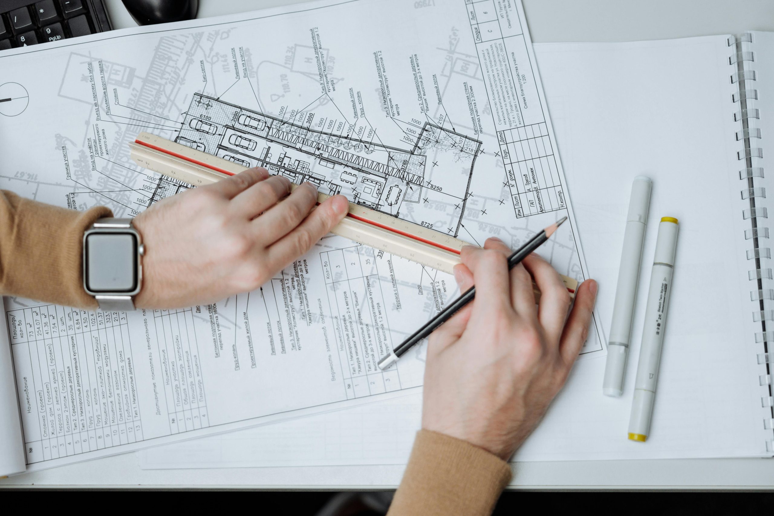 Architect drawing a plan for a restaurant bar area