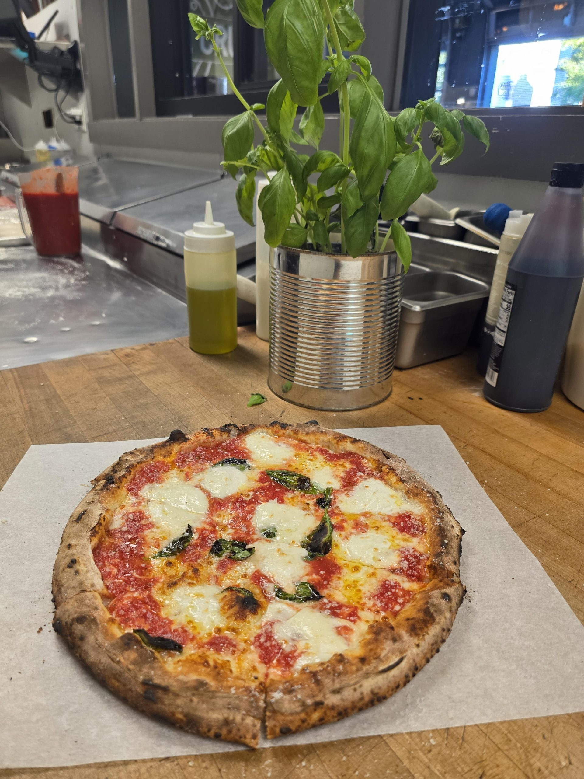 Margherita DOP Neapolitan Pizza at Char Pizzeria Halcyon, created by Chef John Frank Cely and represented by Jimmy Carey Commercial Real Estate, Atlanta’s Premier Restaurant Broker specializing in Restaurant Tenant Representation Atlanta.