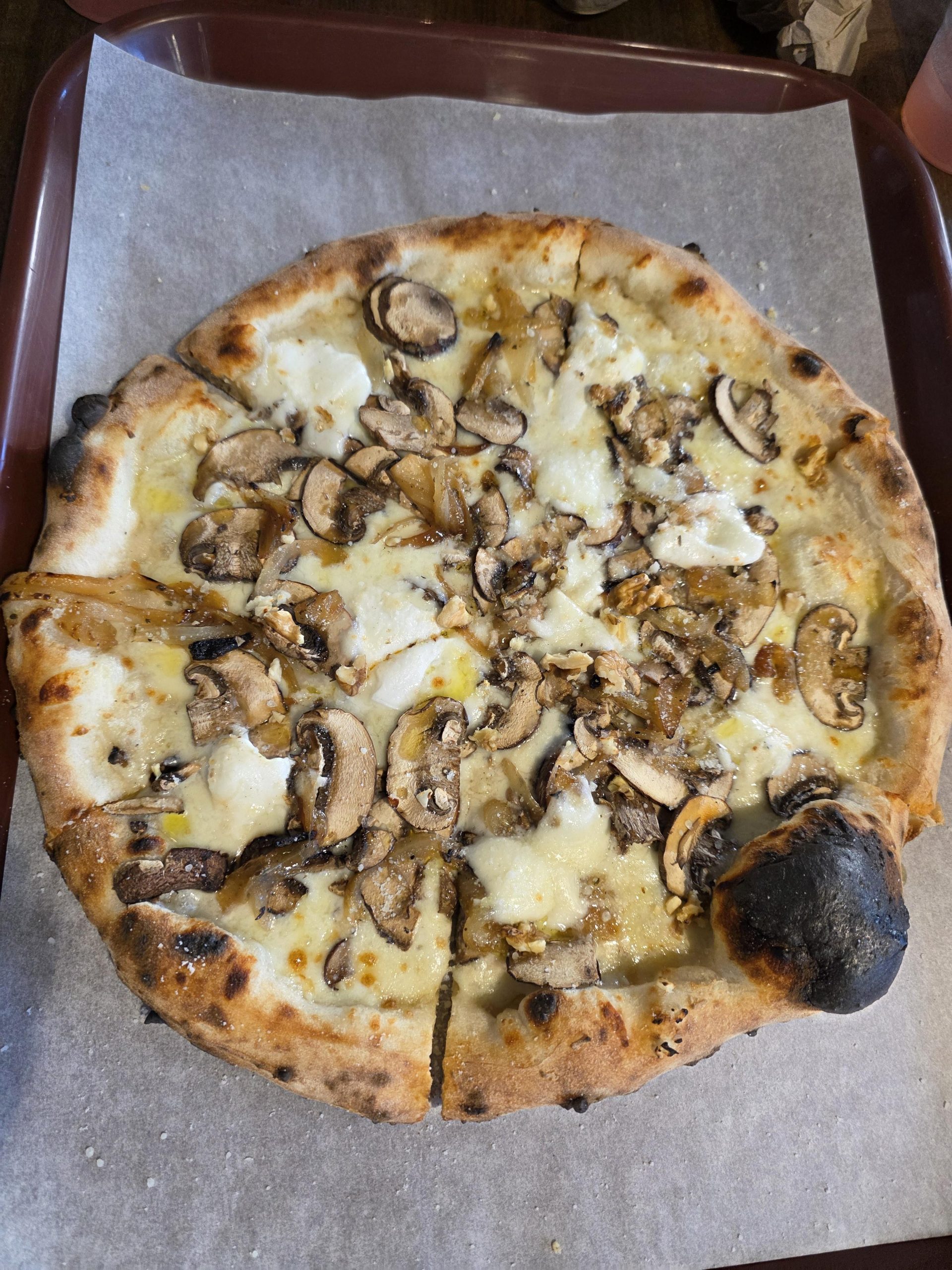 Truffle Wood Pizza at Char Pizzeria Halcyon, created by Chef John Frank Cely and represented by Jimmy Carey Commercial Real Estate, Atlanta’s Premier Restaurant Broker specializing in Restaurant Tenant Representation Atlanta.